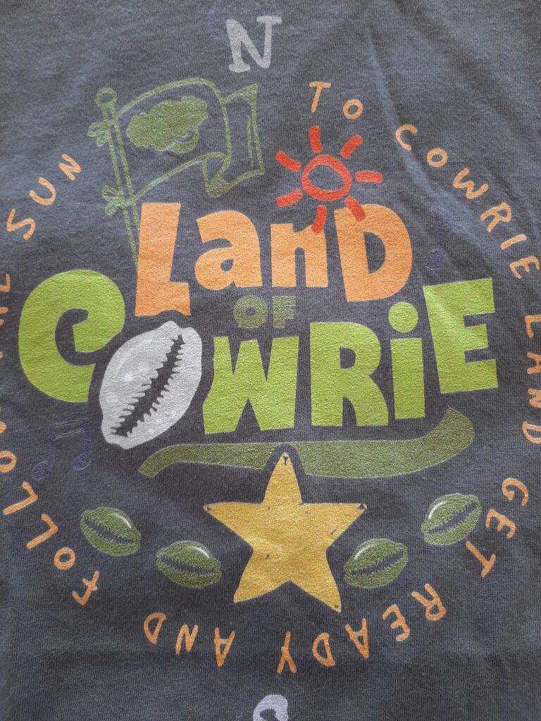 Land of Cowire Black children's t-shirt design